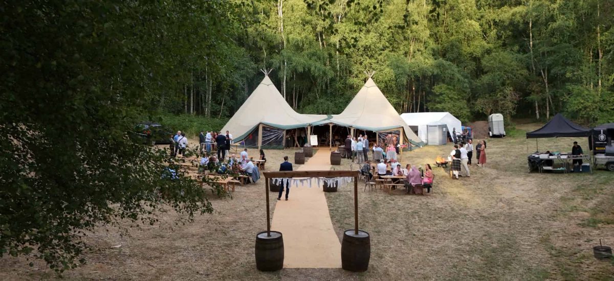 Sherwood Glade's wedding events tent with guests